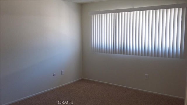 3734 S Marine St, Santa Ana, CA 92704 - carpeted spare room featuring baseboards