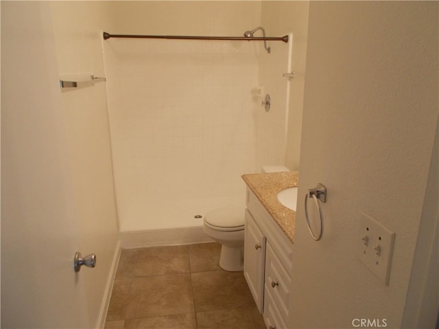 3734 S Marine St, Santa Ana, CA 92704 - bathroom with a stall shower, vanity, toilet, tile patterned flooring, and baseboards