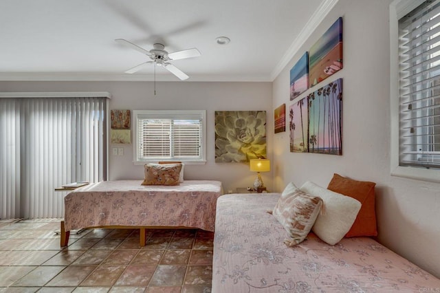 bedroom featuring ceiling fan and crown molding