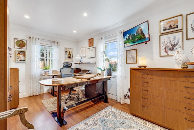 office featuring crown molding and light wood-type flooring