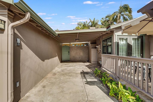 view of patio / terrace featuring a carport