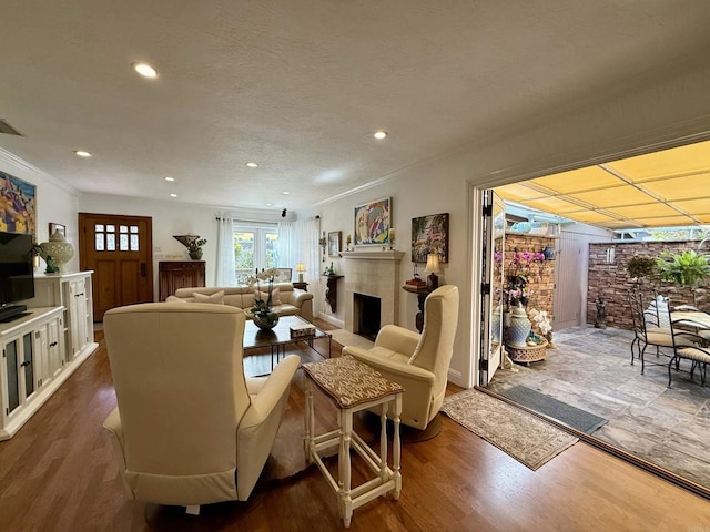 living room featuring dark wood-type flooring, crown molding, and french doors