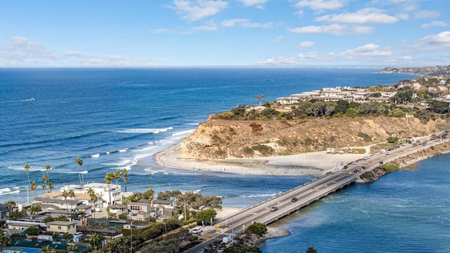 bird's eye view with a beach view and a water view