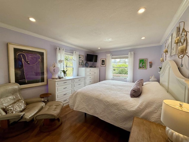 bedroom featuring wood-type flooring and crown molding