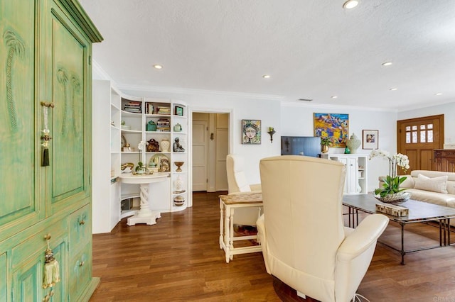 interior space with dark hardwood / wood-style flooring and crown molding