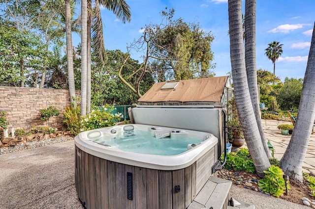 view of patio / terrace featuring a hot tub