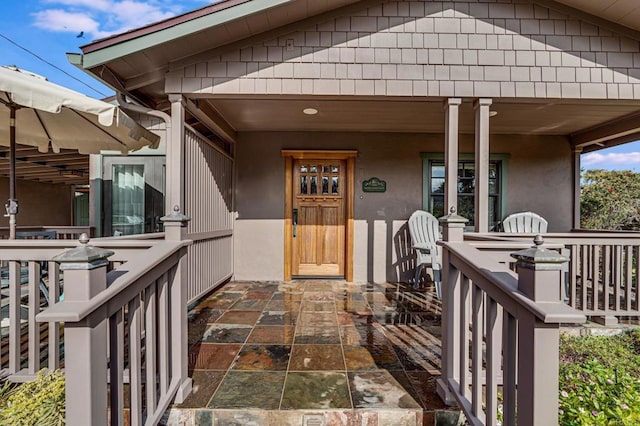 property entrance with a porch