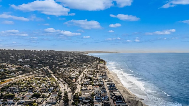 bird's eye view with a water view and a view of the beach