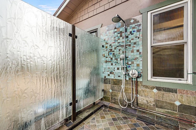 bathroom featuring vaulted ceiling