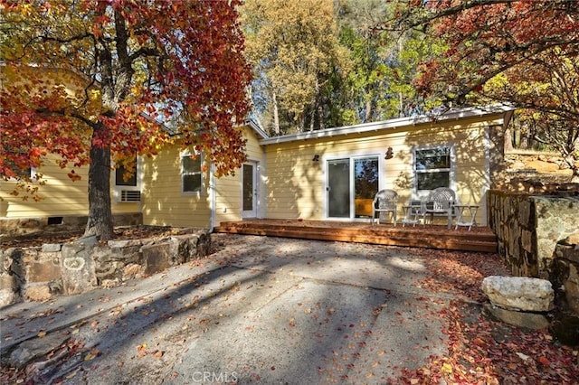 view of front of house with a wooden deck