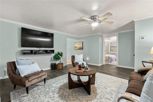 living room featuring ceiling fan, dark hardwood / wood-style floors, and ornamental molding