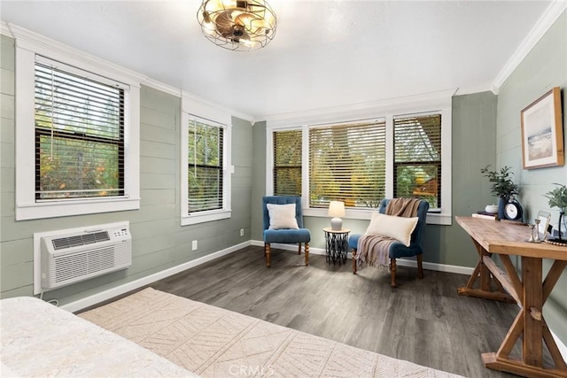 sitting room featuring a wealth of natural light, dark wood-type flooring, and ornamental molding