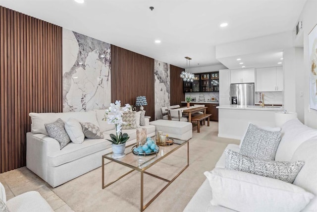 living room with a notable chandelier