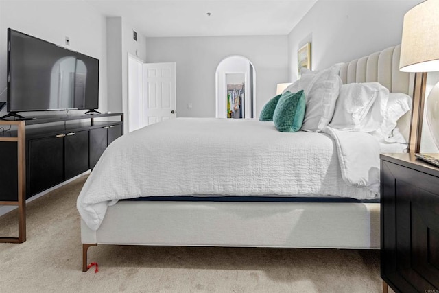 carpeted bedroom featuring a closet