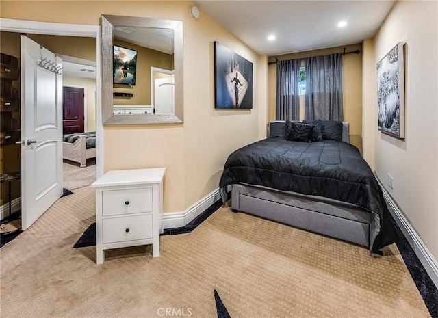 bedroom with light carpet