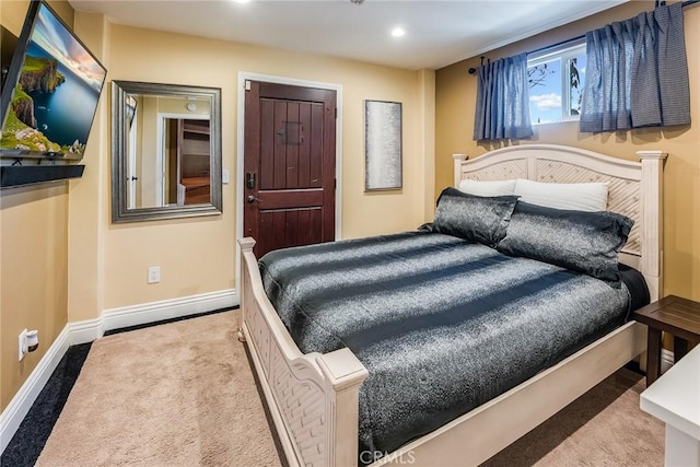 bedroom with light carpet