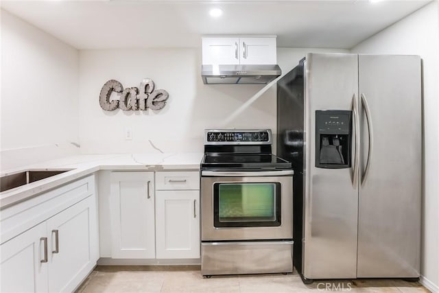 kitchen featuring appliances with stainless steel finishes, exhaust hood, white cabinetry, sink, and light stone counters