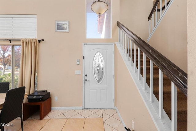 entrance foyer featuring light tile patterned floors