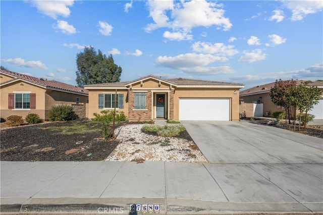 single story home featuring a garage