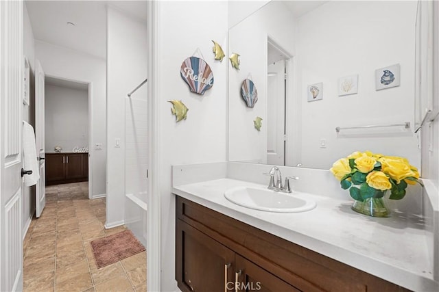 bathroom with vanity and walk in shower