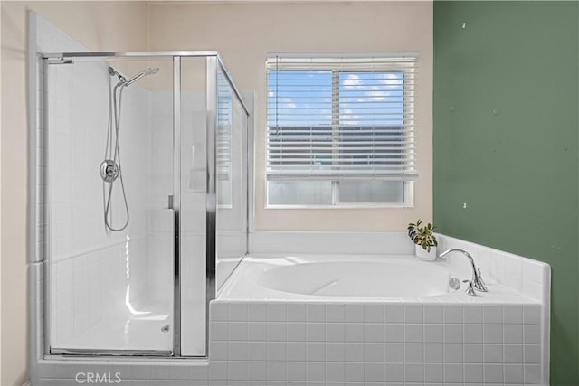 bathroom featuring plus walk in shower