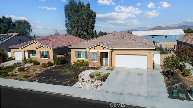 single story home featuring a garage