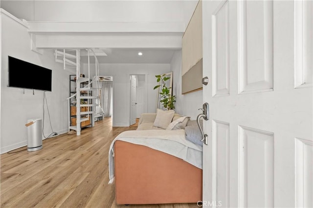 bedroom with light hardwood / wood-style flooring