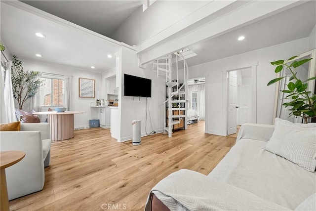 living room with light hardwood / wood-style flooring