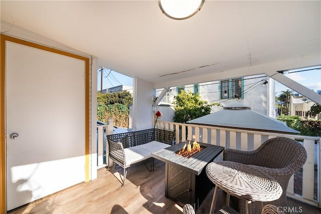 balcony featuring a fire pit