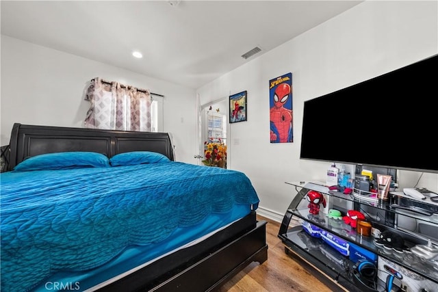 bedroom featuring light wood-type flooring