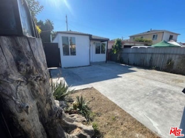 rear view of house featuring a patio area