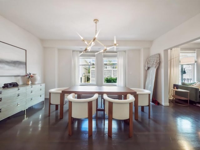 dining room with a notable chandelier