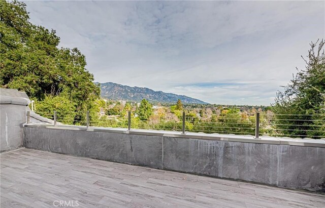 deck featuring a mountain view