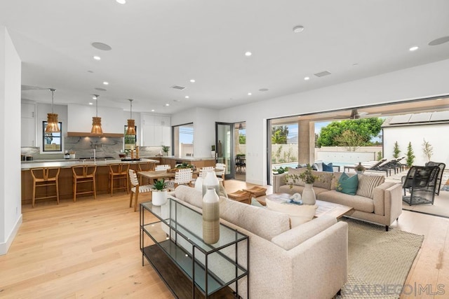 living room featuring light wood-type flooring