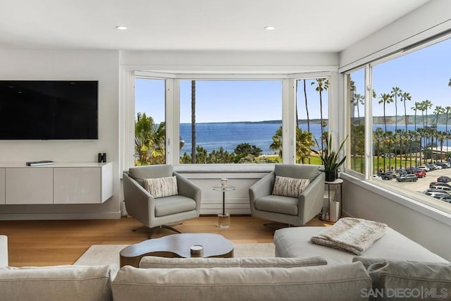 sunroom with a water view