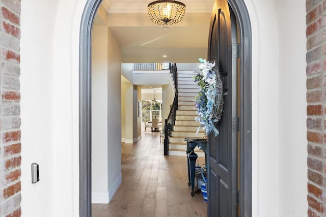 interior space with an inviting chandelier and light hardwood / wood-style flooring