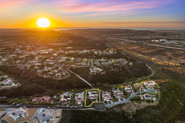 view of aerial view at dusk