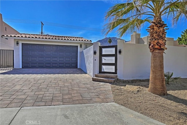 view of front of home with a garage