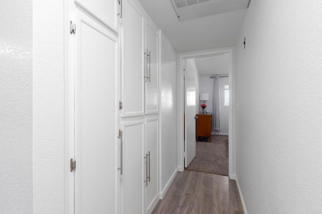 hallway featuring hardwood / wood-style flooring