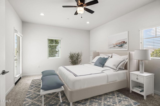 carpeted bedroom featuring ceiling fan