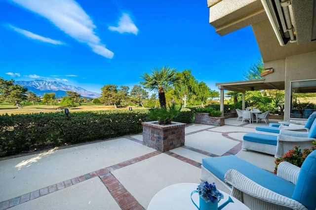 view of patio with a mountain view