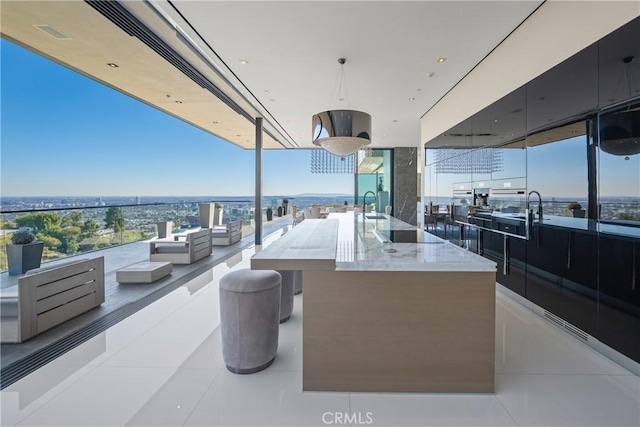 view of patio with an outdoor wet bar