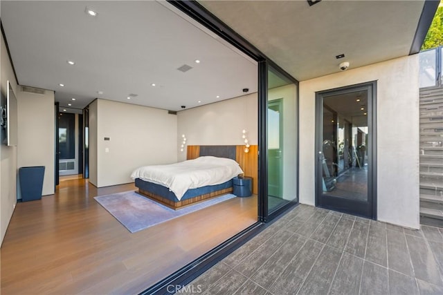 bedroom featuring hardwood / wood-style floors