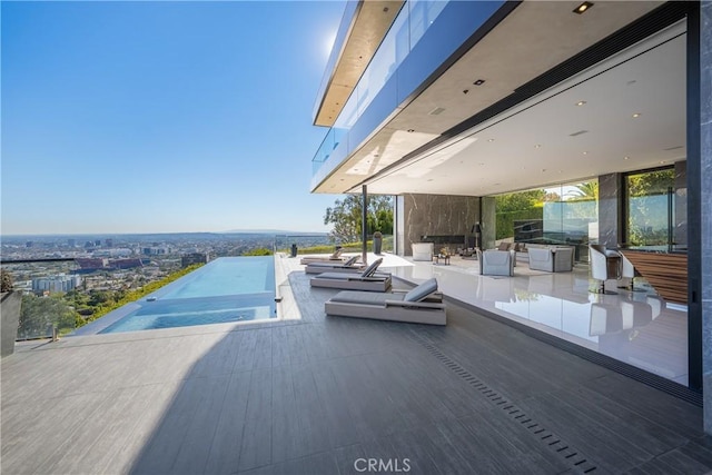 view of pool featuring an outdoor kitchen