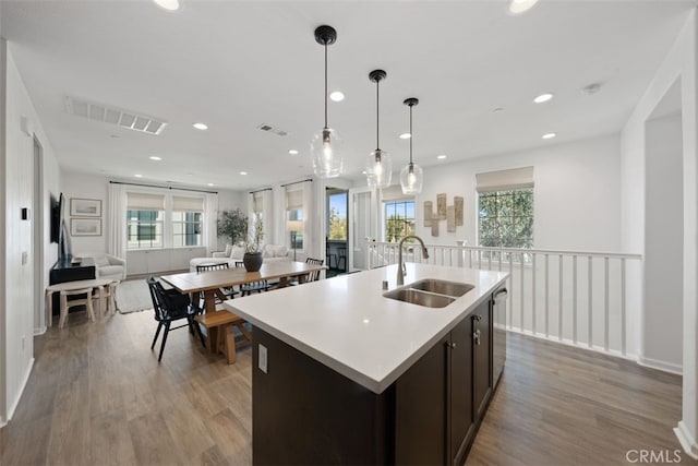 20 Jaripol Cir, Rancho Mission Viejo, CA 92694 - kitchen with visible vents, a sink, stainless steel dishwasher, open floor plan, and light countertops