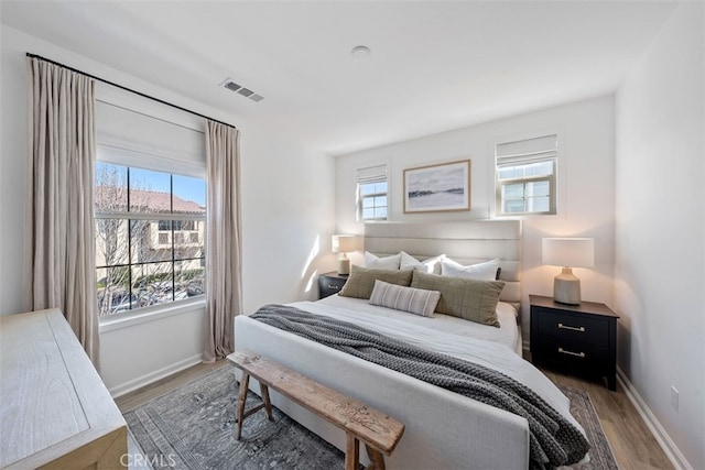 20 Jaripol Cir, Rancho Mission Viejo, CA 92694 - bedroom with wood finished floors, visible vents, and baseboards