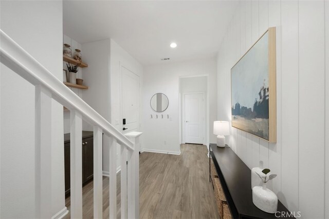 20 Jaripol Cir, Rancho Mission Viejo, CA 92694 - hallway featuring light wood-type flooring, baseboards, and visible vents