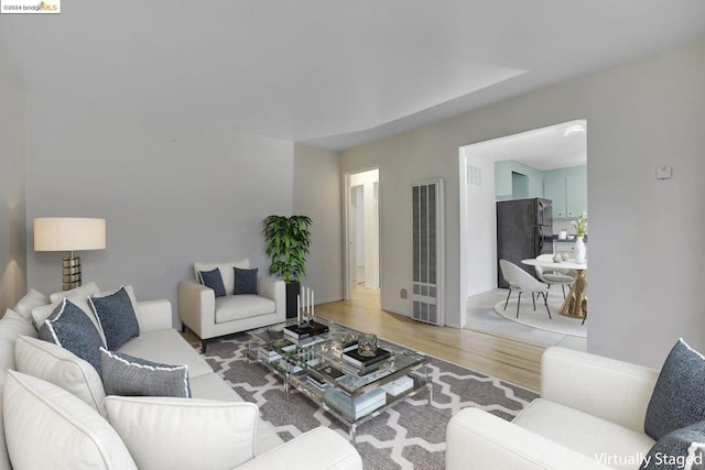 living room with hardwood / wood-style floors