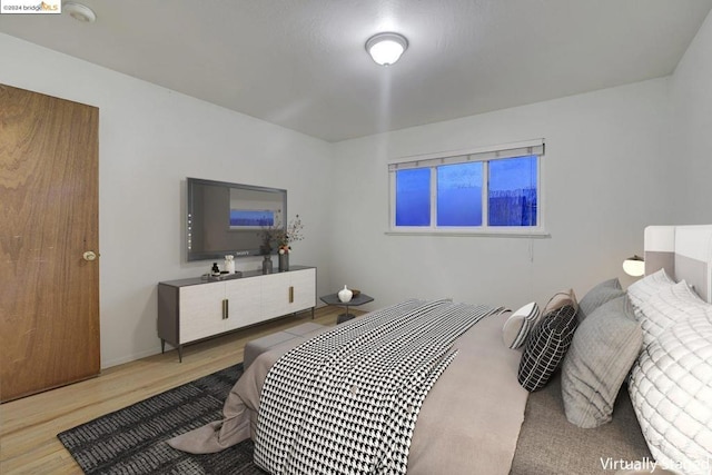 bedroom featuring hardwood / wood-style flooring