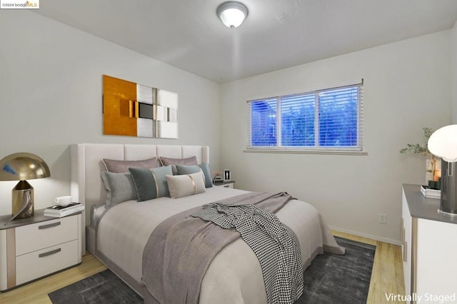 bedroom featuring light hardwood / wood-style floors